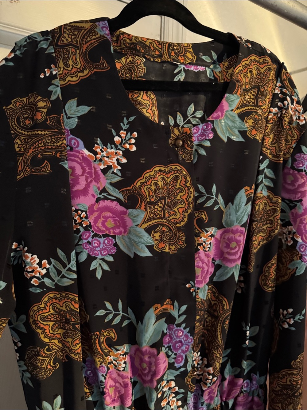 vintage-style black floral Paisley dress from the 1980s or 90s,